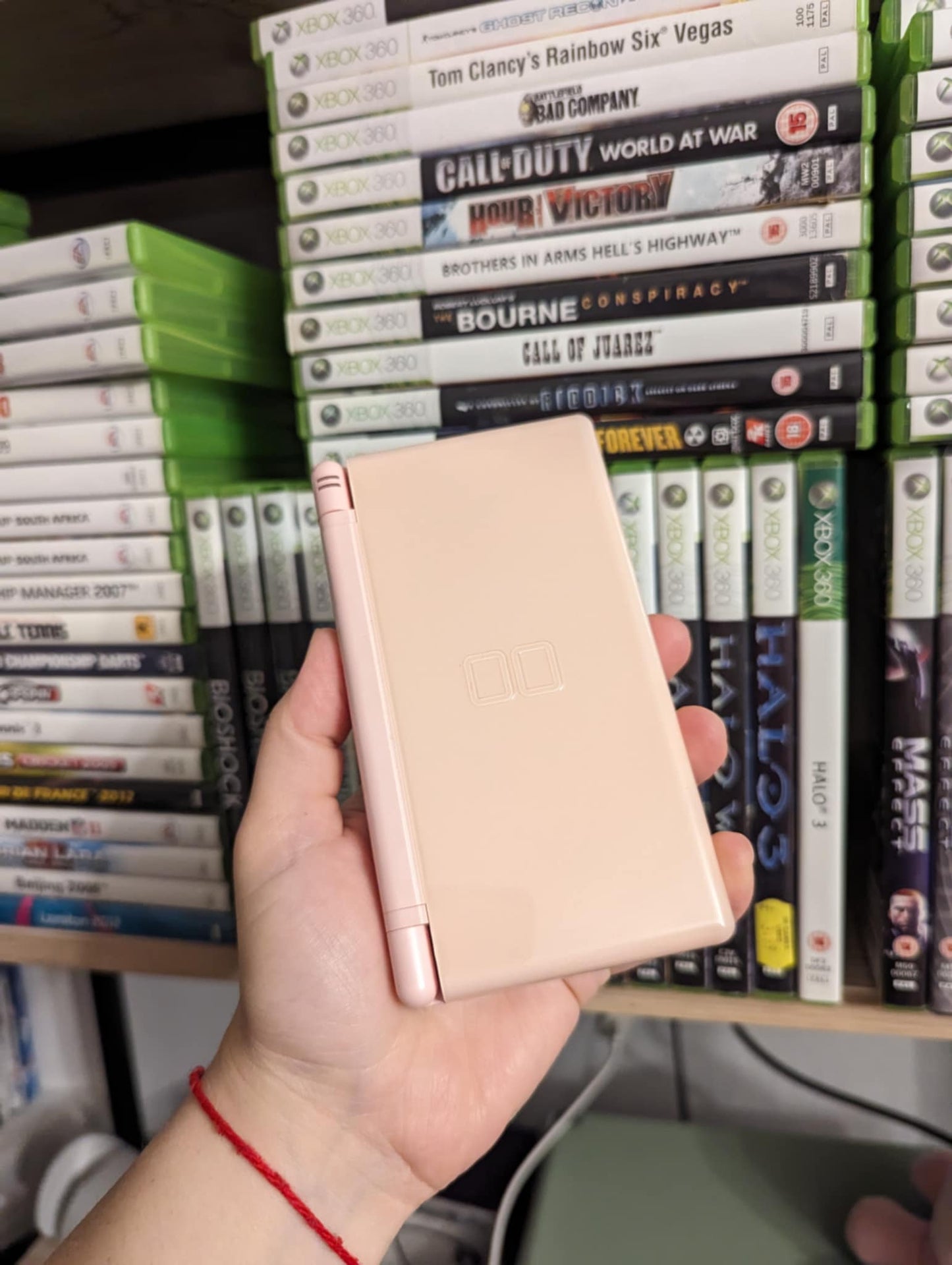 Nintendo DS lite + აქსესუარების ჩანთა