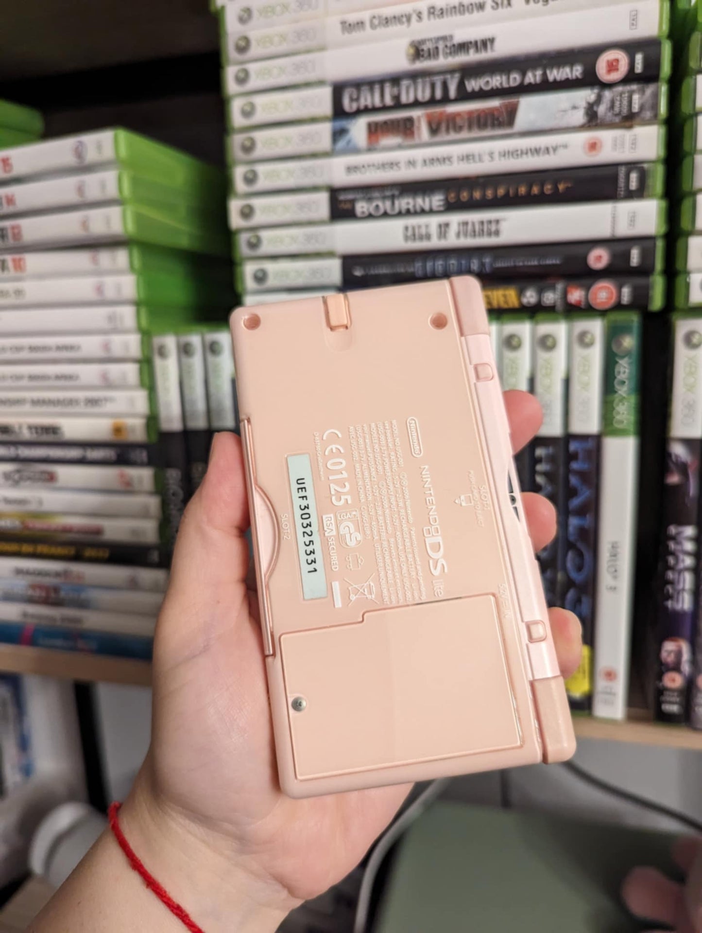 Nintendo DS lite + აქსესუარების ჩანთა