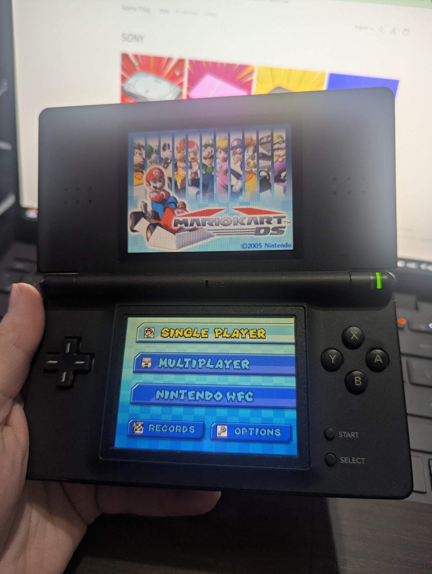 Nintendo DSi Black + mariokart
