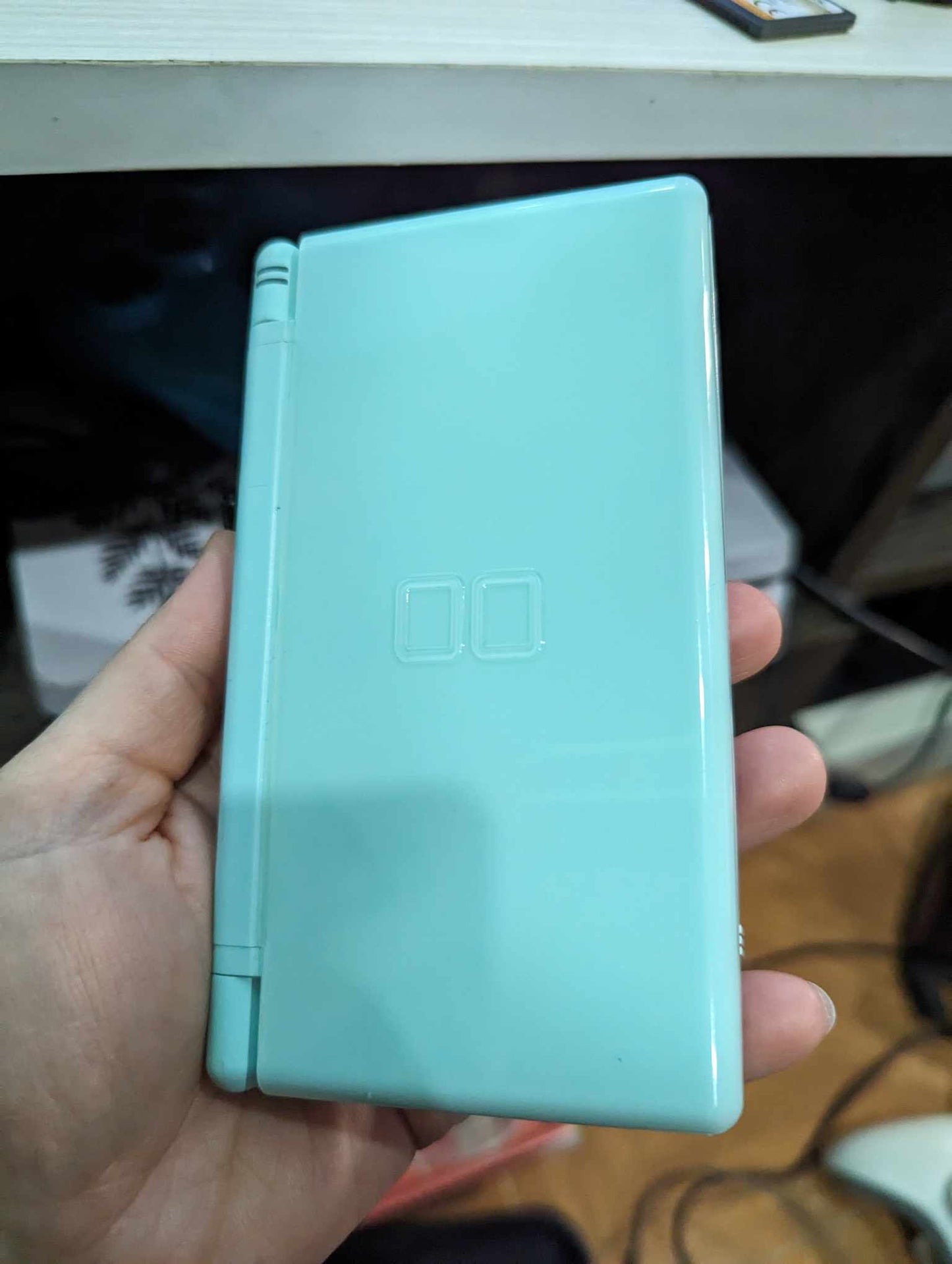 Nintendo DSi Light blue + games