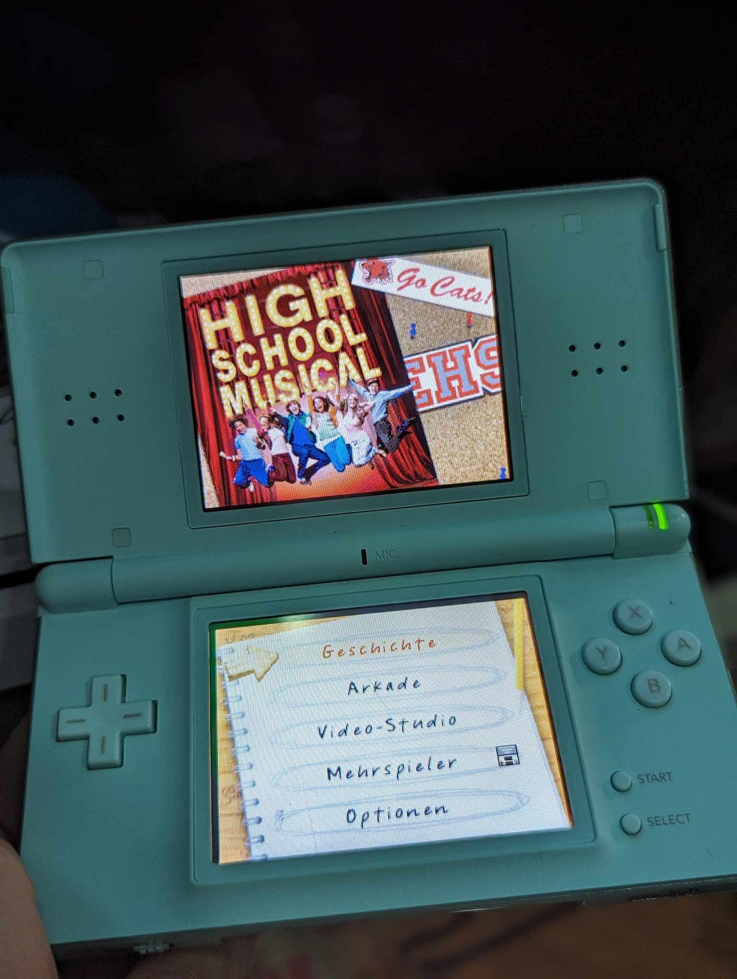 Nintendo DSi Light blue + games