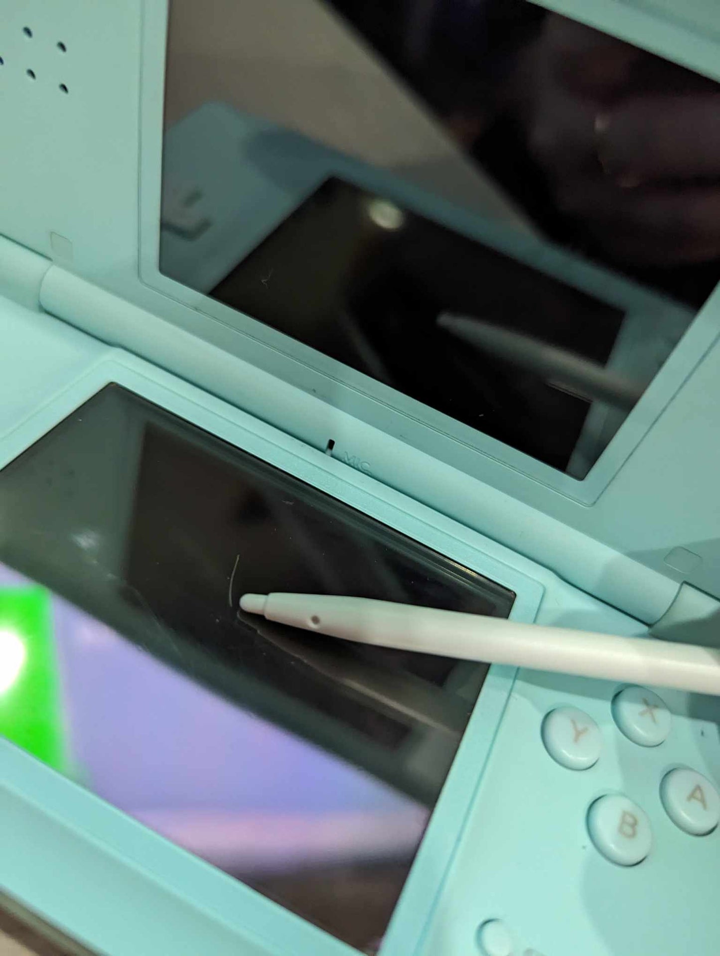 Nintendo DSi Light blue + games